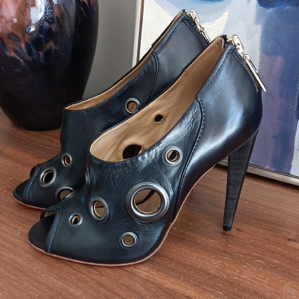 L.A.M.B. Black Stiletto Peep-Toe Heels with Silver Eyelets